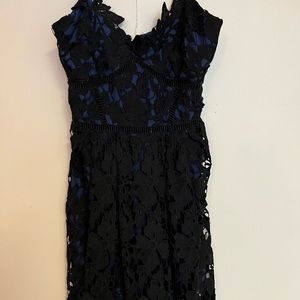 Lace black cocktail dress.
